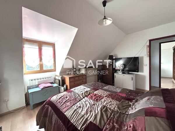 Maison de 104 m², 6 pièces, 4 chambres, terrain de 879 m²