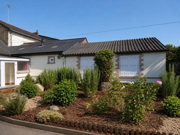 Maison avec jardin et 2 garages