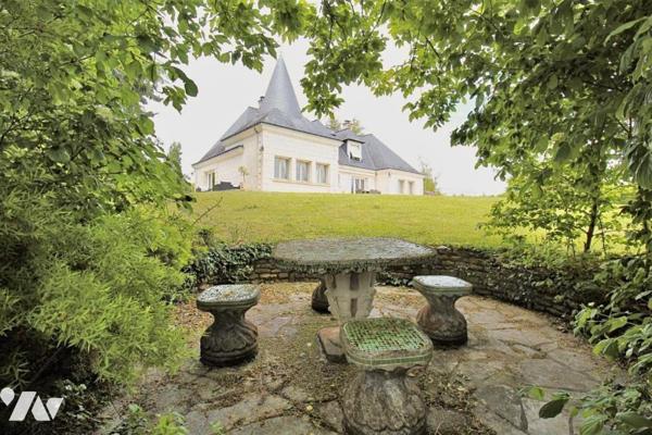 Maison d'architecte sur parc paysagé 