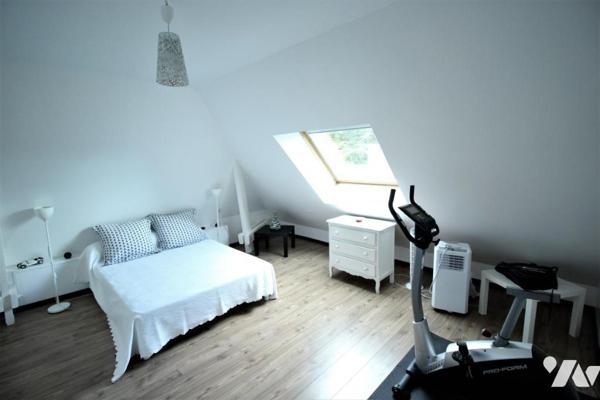 Maison d'architecte sur parc paysagé 