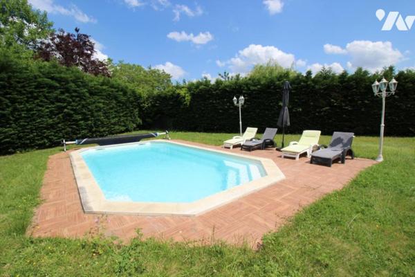 Maison d'architecte sur parc paysagé 