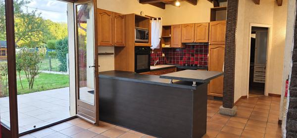 Maison 110 m2 avec terrain clos, garage et buanderie