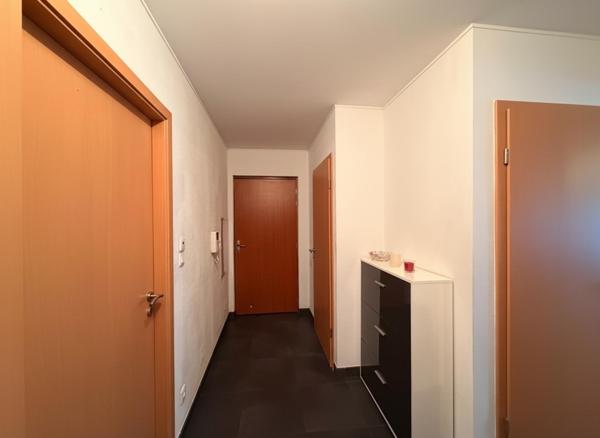 Appartement avec balcon cave et Box de stationnement sécurisé