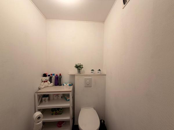 Appartement avec balcon cave et Box de stationnement sécurisé