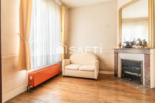 Bien placée près de la gare et des commerces