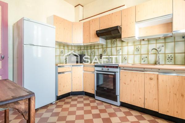 Bien placée près de la gare et des commerces