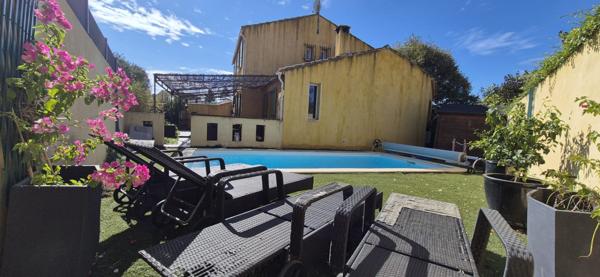 Maison Gigean 4 pièce(s) 140 m2 avec piscine