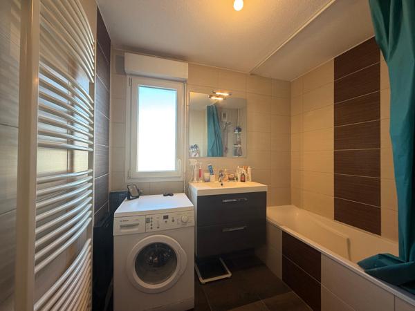 Coquet appartement T3 avec accès PMR, terrasse, garage et place de parking