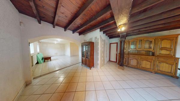 Maison avec potentiel et cadre verdoyant