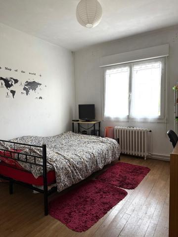 Idéal investisseur T4 d'environ 85 m2 ave balcon, cave et Garage