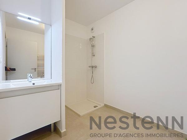 Appartement 3 pièce(s) 70m2 avec 2 balcons et place de parking sous-sol