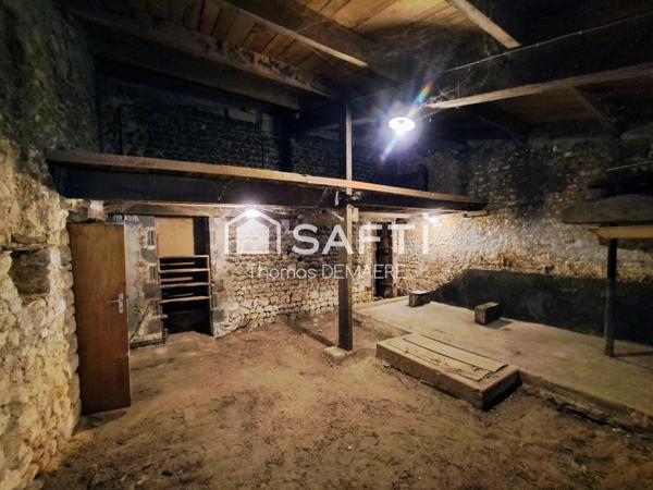 Belle maison en pierre aux portes de la ville