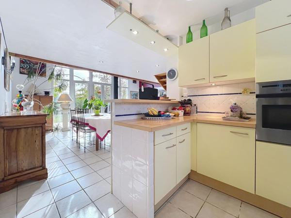 Maison d’architecte 173 m² – 4 chambres – Jardin paysagé et luminosité