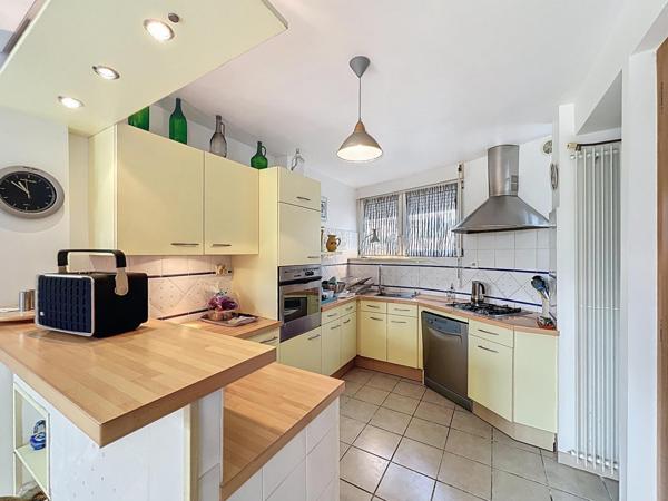 Maison d’architecte 173 m² – 4 chambres – Jardin paysagé et luminosité