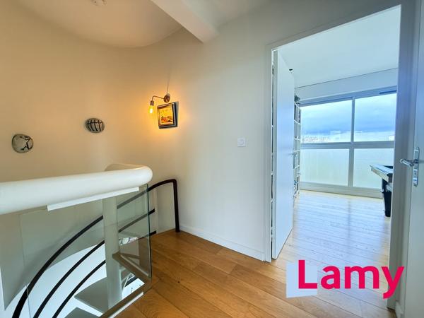 Appartement + cave + stationnement extérieur