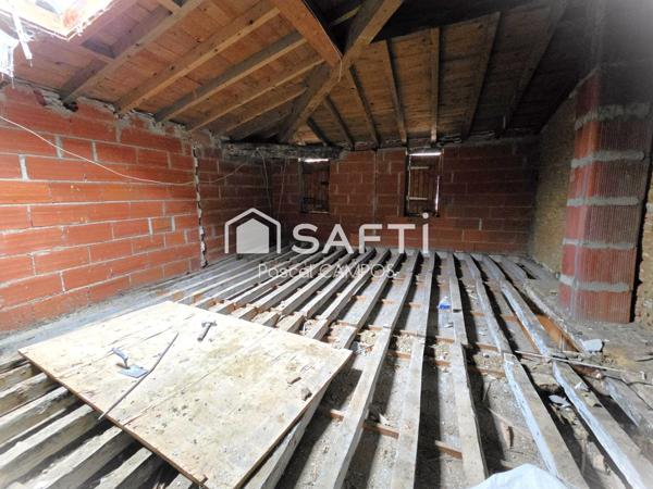 immeuble d'environ 150m² à rénover