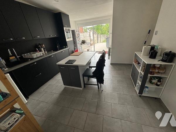 UNE MAISON A USAGE D'HABITATION