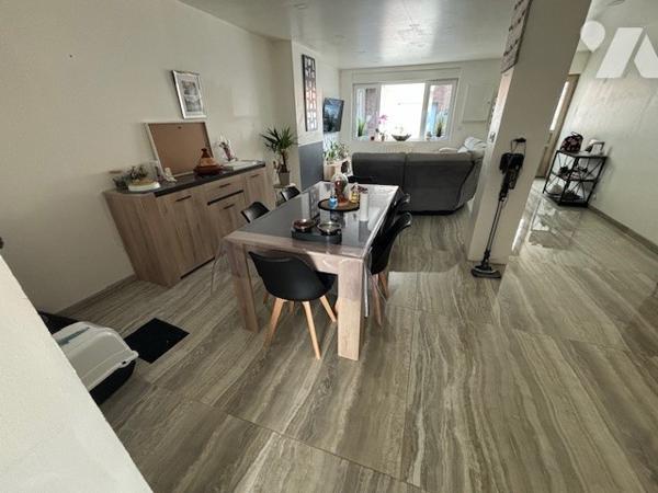 UNE MAISON A USAGE D'HABITATION