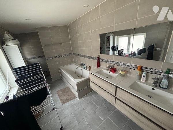 UNE MAISON A USAGE D'HABITATION