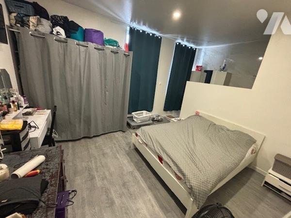 UNE MAISON A USAGE D'HABITATION