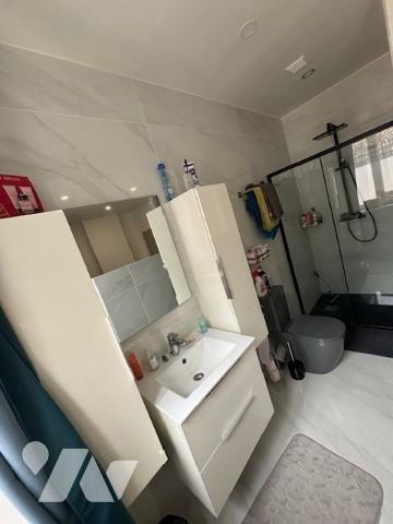 UNE MAISON A USAGE D'HABITATION