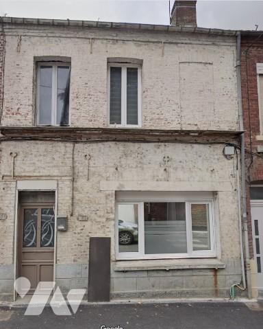 UNE MAISON A USAGE D'HABITATION