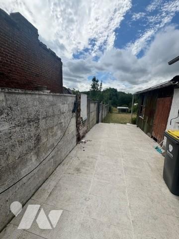 UNE MAISON A USAGE D'HABITATION