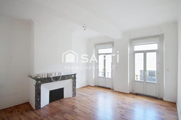 Appartement de 140 m² avec cour privative et dépendance en plein centre-ville