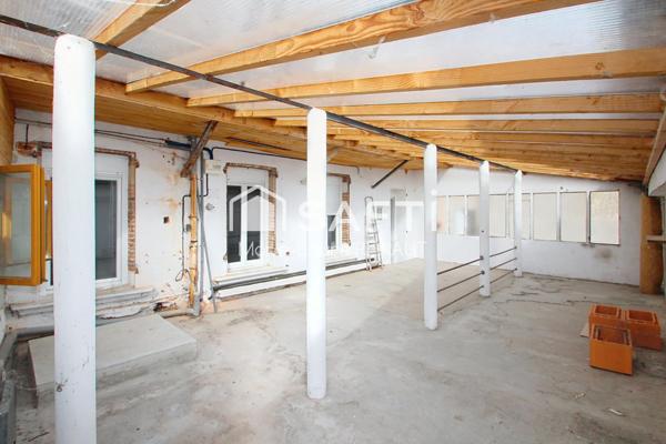 Appartement de 140 m² avec cour privative et dépendance en plein centre-ville