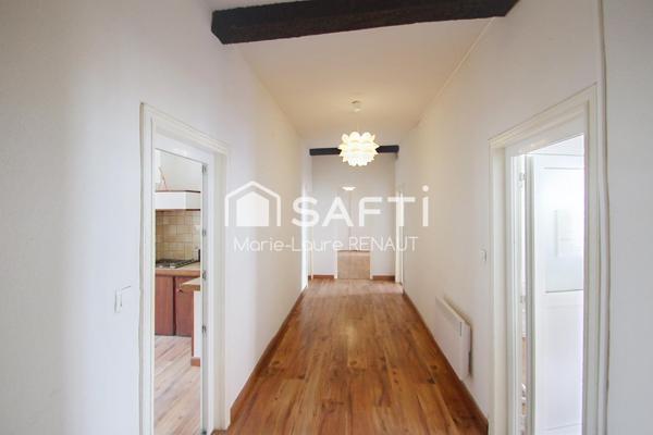 Appartement de 140 m² avec cour privative et dépendance en plein centre-ville