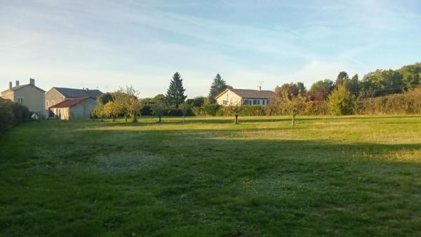 Maison de bourg et terrain