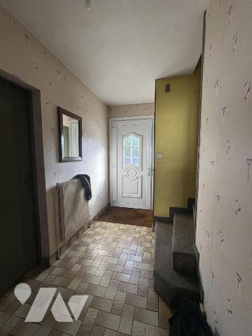 Une maison mitoyenne de 89 m² avec jardin et garage, quartier Bourg/ Centre-Ville