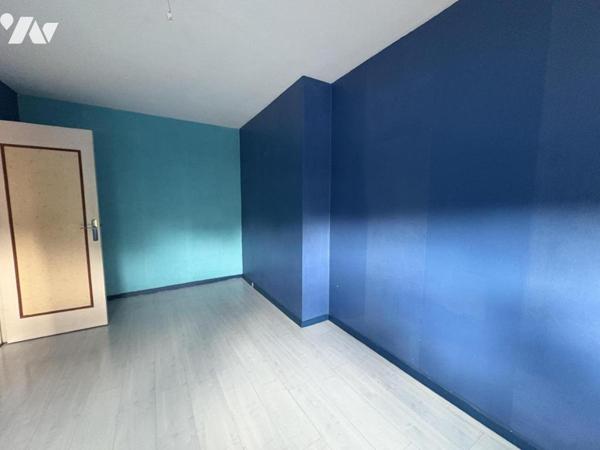 Une maison mitoyenne de 89 m² avec jardin et garage, quartier Bourg/ Centre-Ville