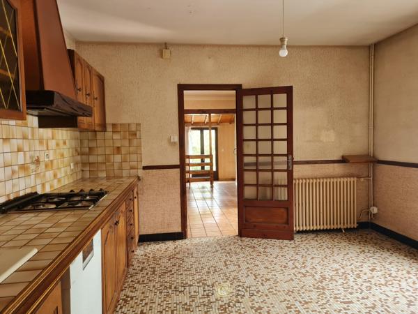 Maison de plain-pied non loin des commodités avec jardin et garage !