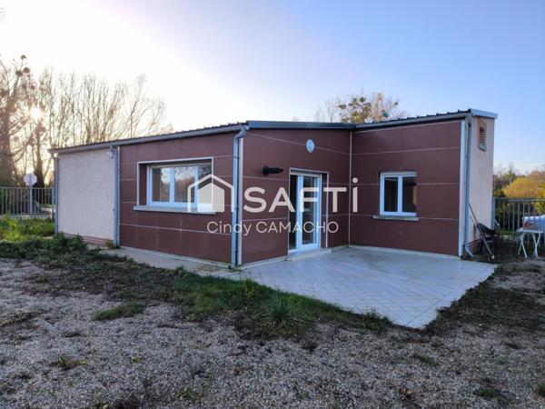 Envie d'évasion ? Cette maison avec parcelle d'étang vous transporte au cœur de la nature, tout en étant proche de toutes les commodités