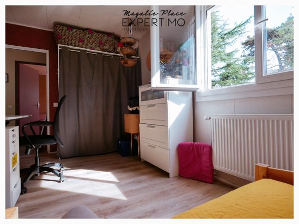 APPARTEMENT DANS UN ENVIRONNEMENT VERDOYANT CALME avec cave et parking