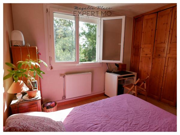 APPARTEMENT DANS UN ENVIRONNEMENT VERDOYANT CALME avec cave et parking