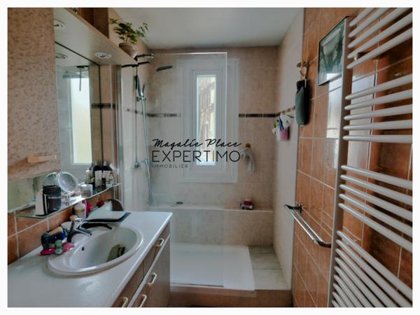 APPARTEMENT DANS UN ENVIRONNEMENT VERDOYANT CALME avec cave et parking