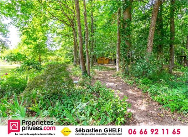 belle maison avec 4 chambres dont 1 suite avec superbe parc arboré