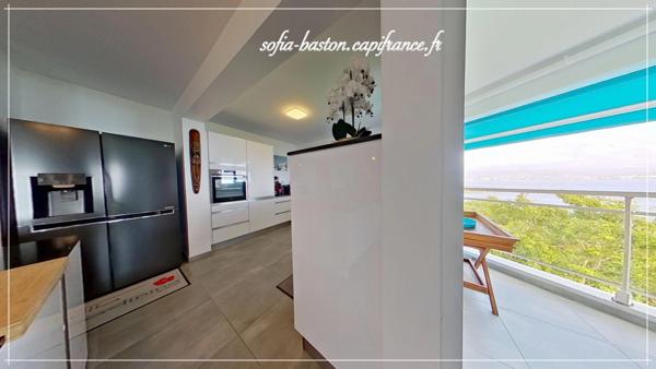 Les Trois-Îlets (972) Appartement T4 de prestige - Vue mer panoramique, loggia 30m2 avec spa et parkings couverts dans résidence sécurisée.