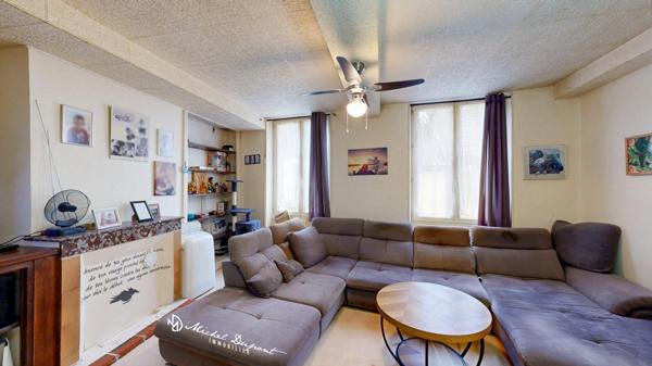 Appartement de 83 m² avec surface commerciale vitrée