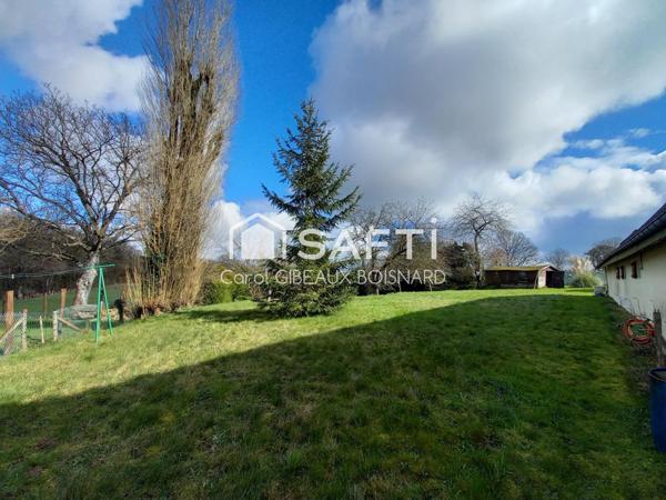 Longère 5 chambres et bureau avec double garage et terrain