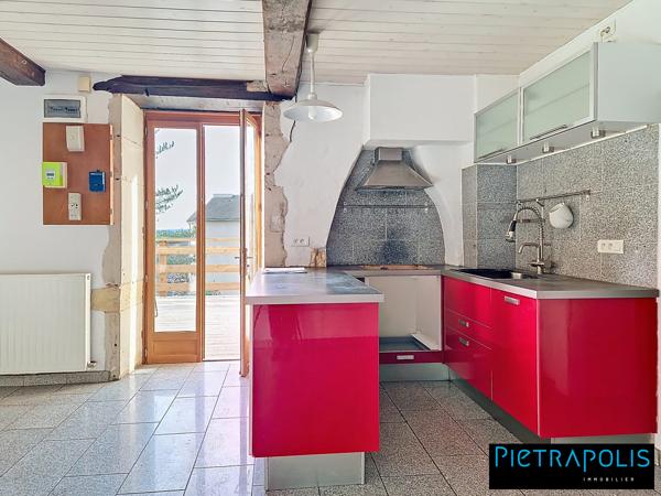 Maison avec terrasse et jardin, proche du centre