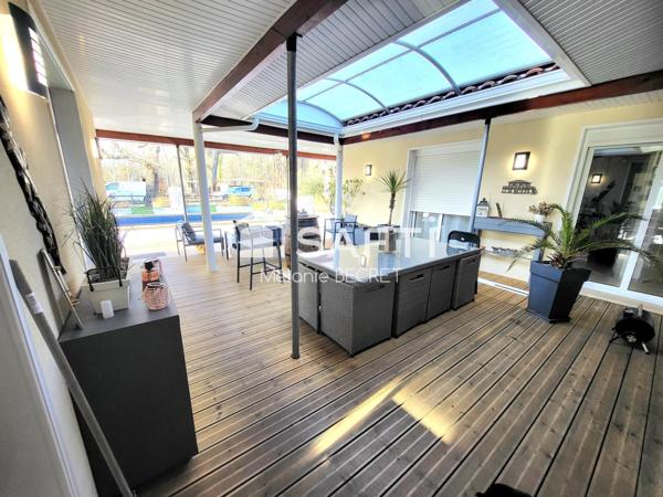 Maison à Marcheprime avec un grand terrain et piscine au calme