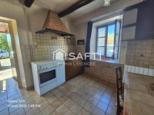 Maison avec cour... Grange jardin et puits d'eau