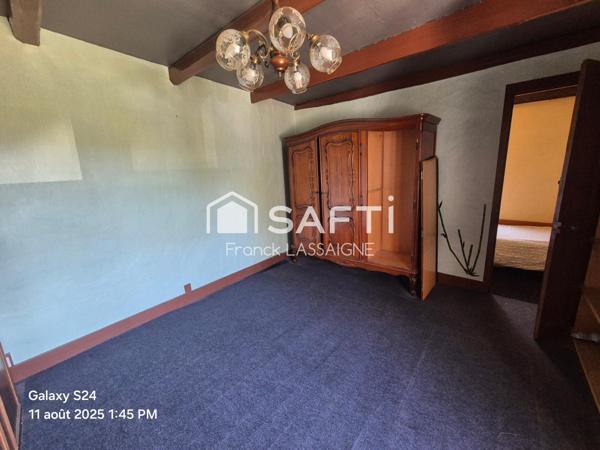 Maison avec cour... Grange jardin et puits d'eau