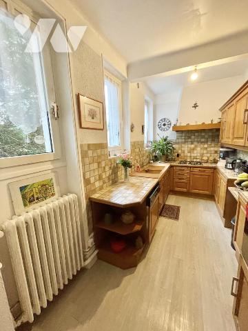 Maison 4 pièces avec jardin et garage.