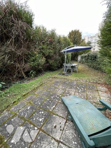 Maison 4 pièces avec jardin et garage.