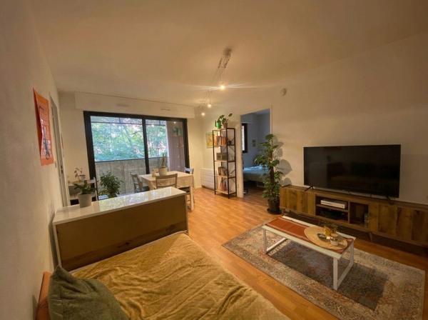 Appartement + stationnement + cave