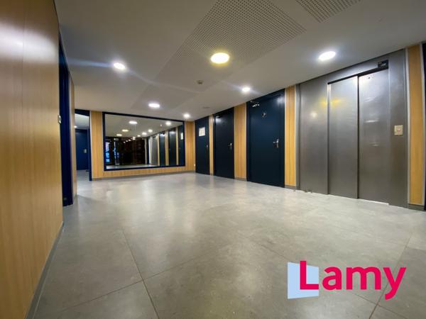 Appartement + stationnement + cave